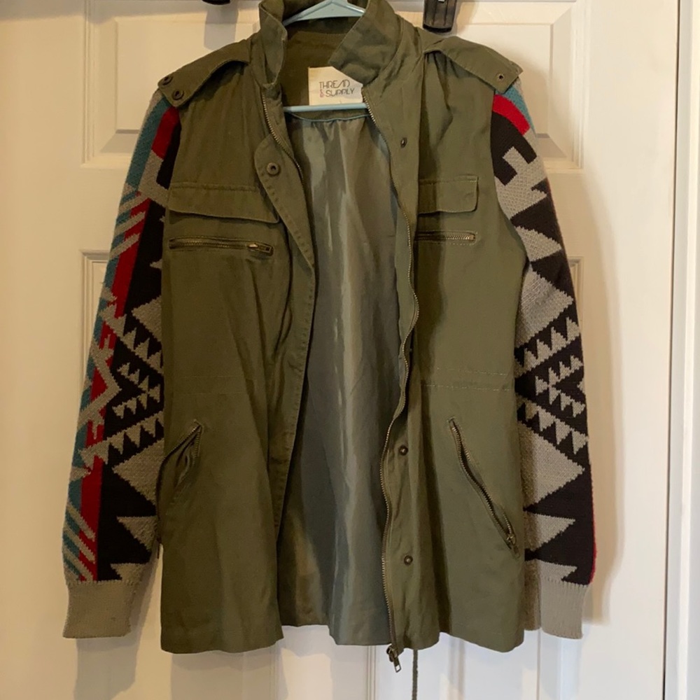 Green jacket. Worn once. Like new. Smoke free home.